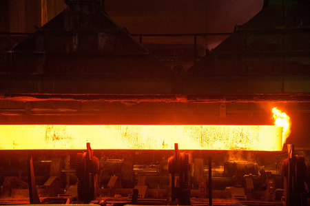 Manufacture of steel pipes in the factoryの写真素材