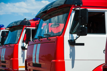 Car pool with fire engines of fire department