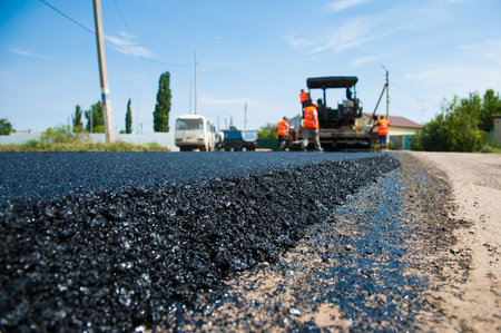 The road rollers working on the new road construction site