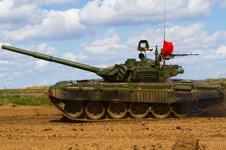Army tank. Military training. Summer military exercises.