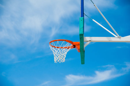 Basketball board over the sky. Outdoor basketball court