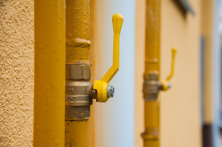 Crane mounted on the gas pipe leading to the houseの写真素材