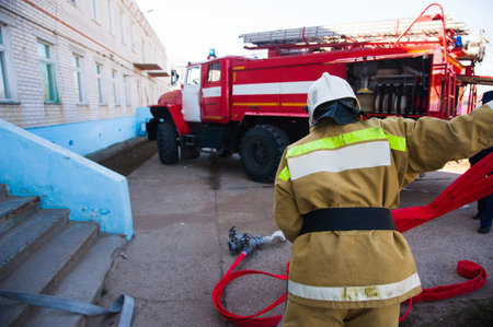 Firefighter in action. Emergency safety. Protection, rescue from danger
