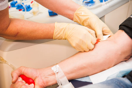 Patient getting blood transfusion in hospital clinic