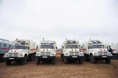 Car pool with fire engines of fire departmentの写真素材