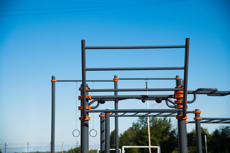 Outdoor gym for street workout. Modern outdoor gym in the residential area. Sports ground.