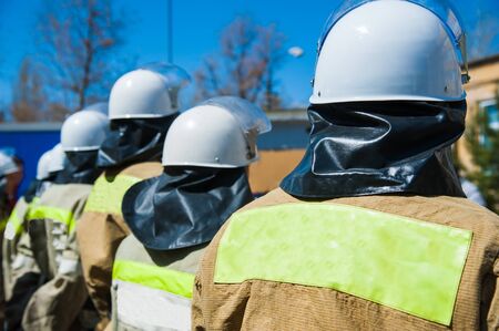 Firefighter in action. Emergency safety. Protection, rescue from dangerの写真素材