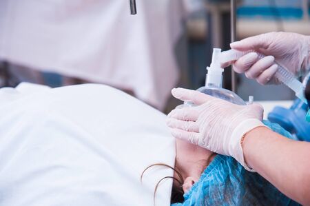 Saving life in hospital operating room. Doctor working in operating roomの写真素材