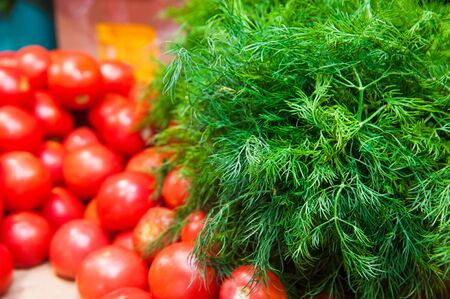 Fresh fruits and vegetables. Dill is sold in the marketの写真素材
