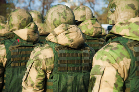 Russian police officers in uniform. Text in russian: special police unit (OMON)