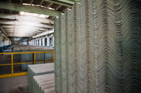 Asbestos roof. Asbestos cement roofing sheets, corrugated panels, stacked.