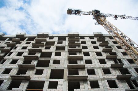 Multi-storey building. Construction of multi-storey residential buildingの写真素材