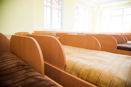 Big room with beds. Bedroom in the kindergartenの写真素材