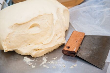 Bakery. Production of bread, rolls, pies and cookies. Baker's jobの写真素材