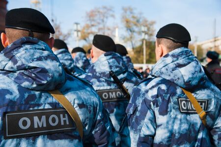 Russian police officers in uniform. Text in russian: "special police unit (OMON)"の写真素材