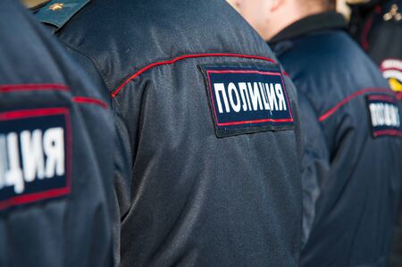Russian police officers in uniform. Text in russian: "Police"の写真素材