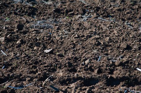 Ploughed field. Plowed in winter field (arable land) agricultural landの写真素材