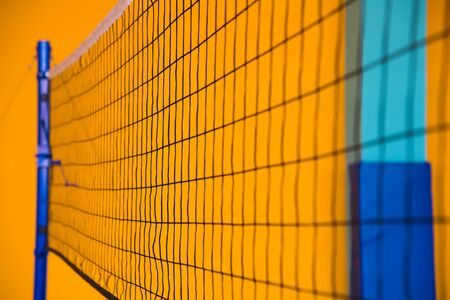 Modern new school building. Empty school gymnasium with yellow floor and climbing near wallsの写真素材