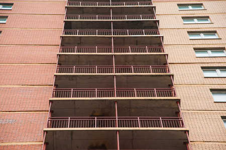 Brand new apartment building against the gray autumn sky
