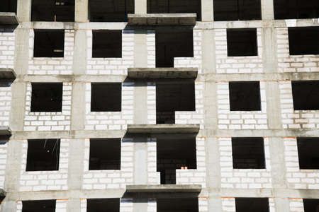 Multi-storey building. Construction of multi-storey residential buildingの写真素材