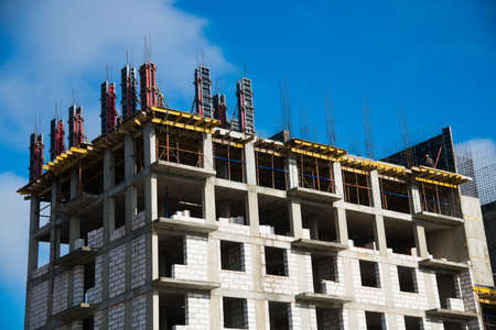 Multi-storey building. Construction of multi-storey residential buildingの写真素材