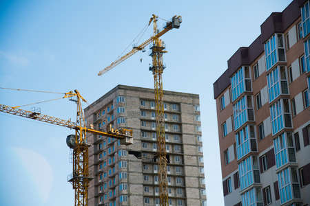 Multi-storey building. Construction of multi-storey residential buildingの写真素材