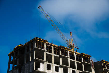 Multi-storey building. Construction of multi-storey residential buildingの写真素材