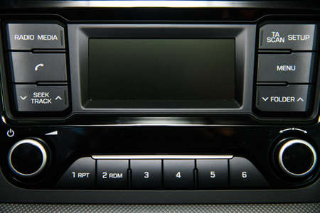 Car interior details close-up. Car dashboard with multifunctional displayの写真素材