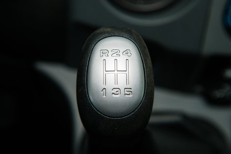 Car interior details close-up. Car shift lever. Manual transmission.