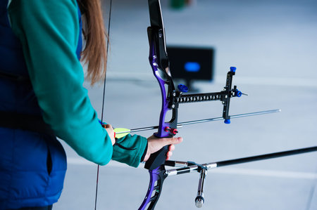 Archery. Archer exercise with the bow. Sport, recreation concept