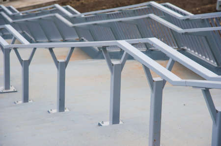 Outdoor concrete staircase with stainless steel handrail. Fall protectionの写真素材