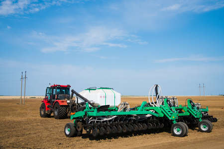 Tractor during plowing. Agricultural tillage in springの写真素材