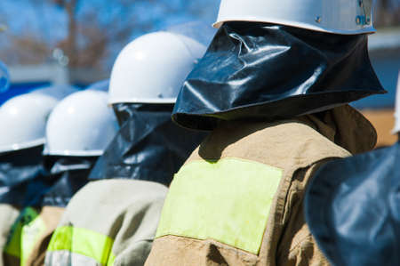 Firefighter in action. Emergency safety. Protection, rescue from dangerの写真素材