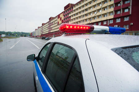 Police car during patrol service for patrolling city streetsの写真素材
