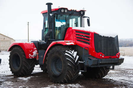 Farm machinery on a farm in the winterの写真素材