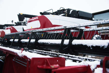 Farm machinery on a farm in the winterの写真素材