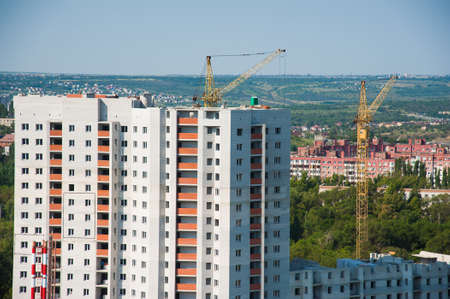 Multi-storey building. Construction of multi-storey residential buildingの写真素材
