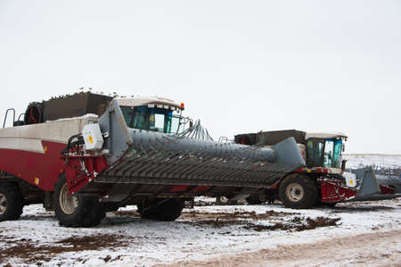 Farm machinery on a farm in the winterの写真素材