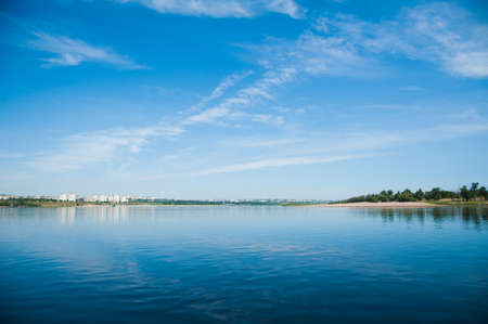Beautiful summer landscape on the river bank, sunny dayの写真素材