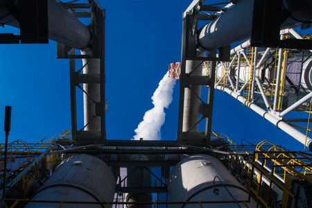 Pipes of an industrial enterprise against the sky. Heavy industryの写真素材