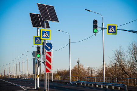 Traffic light at the pedestrian crossing. Traffic light with green light and road sign Pedestrian crossingの写真素材