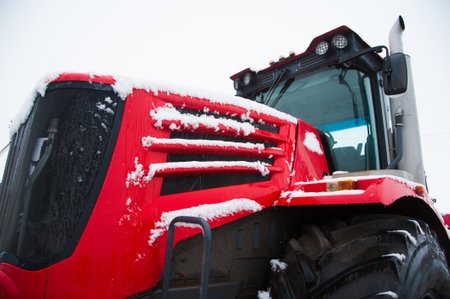 Farm machinery on a farm in the winterの写真素材