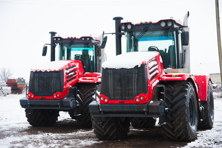 Farm machinery on a farm in the winterの写真素材
