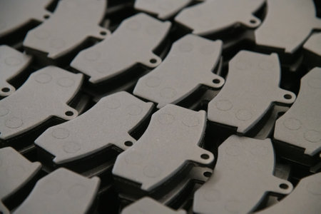 Storage of ready-made brake pads in the shop for their productionの写真素材