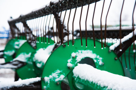 Farm machinery on a farm in the winterの写真素材
