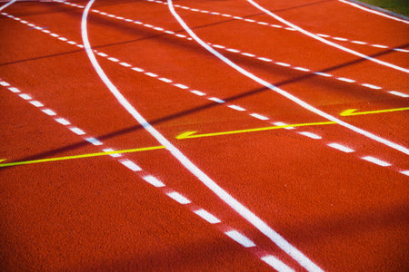 Red running sport track background and texture. Sport running track concept.