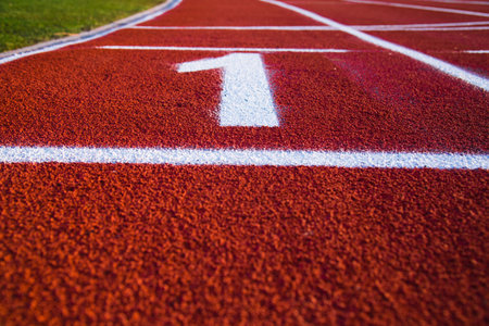 Red running sport track background and texture. Sport running track concept.