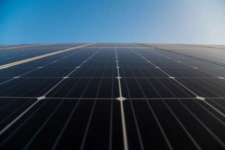 Photovoltaic solar power panel on sky background, green clean Alternative power energy conceptの写真素材