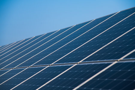 Photovoltaic solar power panel on sky background, green clean Alternative power energy conceptの写真素材