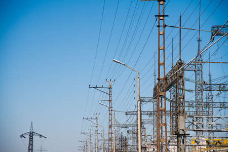 High-voltage power transformer substation. Power plant against a blue skyの写真素材